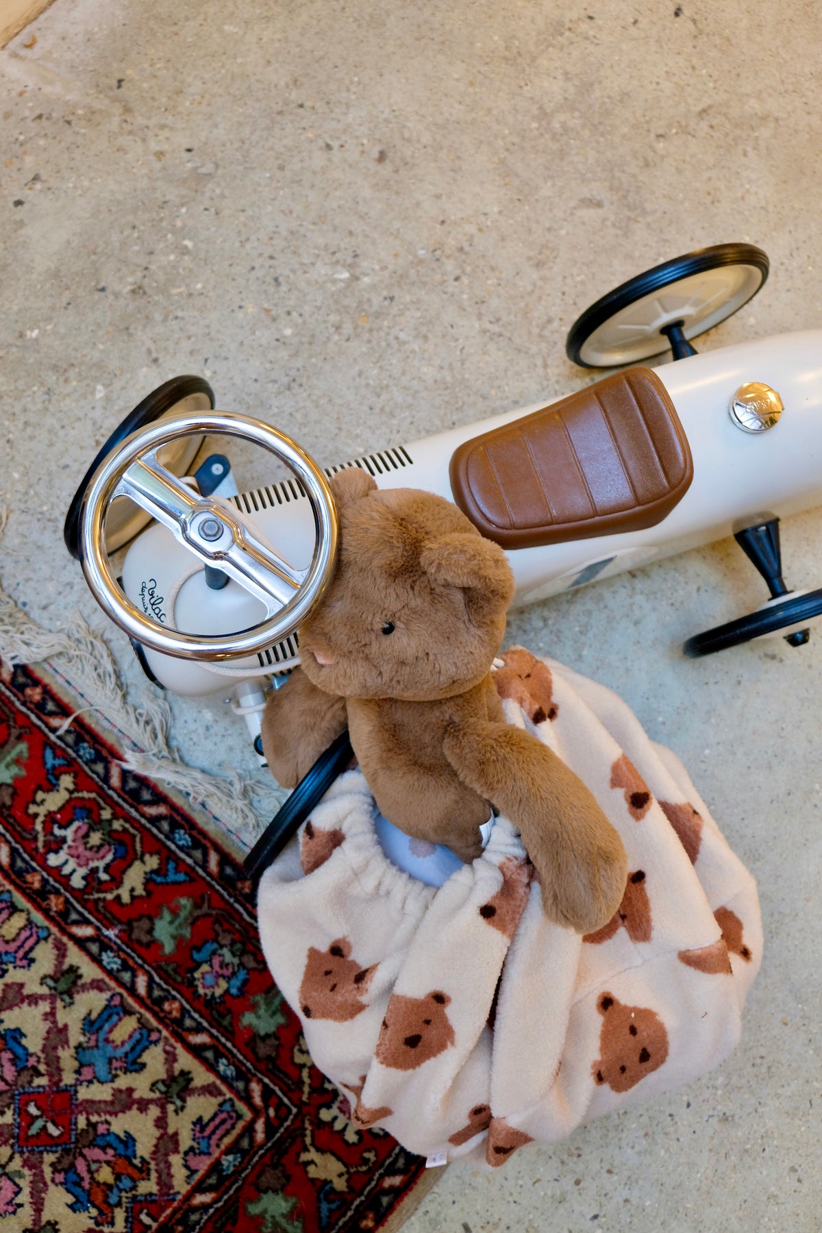 peluche dans nig bag sur porteur enfant