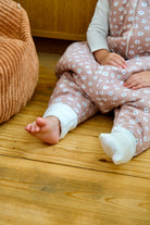 zoom sur pied découvert et pied recouvert sur la gigoteuse guimauve 